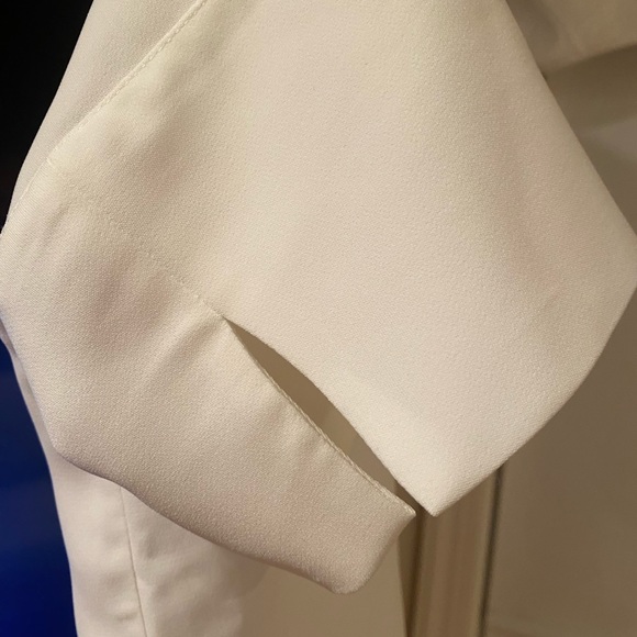 White short sleeve  blouse with cute bow tie back and flattering short sleeve. - Picture 3 of 4